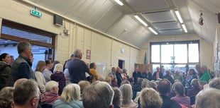 Clanfield residents rally against 200-home plans in packed meeting