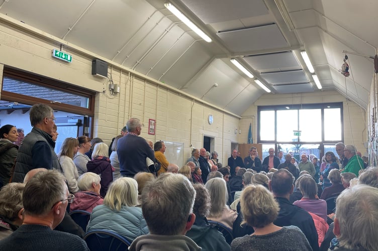People squeezed into the Clanfield Scout Hut to express their concerns and get more information from the planning consultant about next steps. Save Sunderton Fields group 1st public meeting on March 22, 2025.