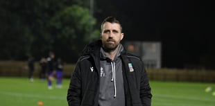 Town boss Johnson signs two-year contract