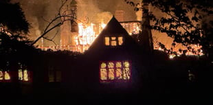 WATCH: Historic house severely damaged in late-night blaze