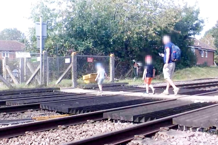 **Embargoed until 00.01 GMT / Wednesday 30 April 2025**  
An adult on a mobile phone whilst supervising children crossing the tracks. Shocking CCTV footage captures the danger of pedestrian distractions at level crossings.  Release date - April 29, 2025.  The montage footage highlights the potential risks of losing focus near a railway line, from a teenager stood in the middle of a level crossing gazing at their mobile phone, to a pram-pushing couple failing to observe safety barrier alarms.  In a world full of distractions, Network Rail is warning of the more serious consequences of being distracted at level crossings. Over the past four years**, there have been 1,574 recorded near miss incidents involving pedestrians at level crossings.  Over that same period, incidents have increased on average by 16% from April to May.