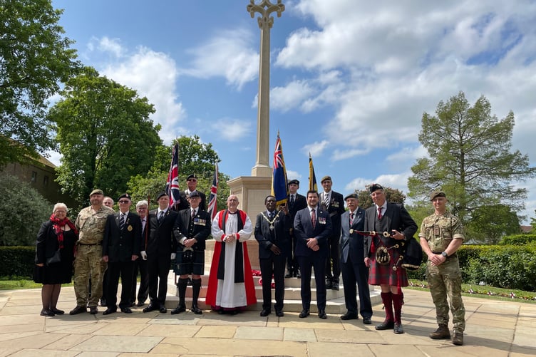 Participants in the wreath-laying ceremony at Farnham War Memorial on VE Day 2025.