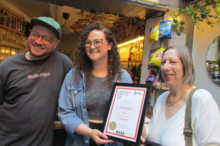 Luke and Becca Cassidy receive East Hants CAMRA's Cider Pub of the Year award from Shirley Hawley, Cassidy's Bar, Alton High Street, April 30th 2025.