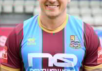 Town sign midfielder from National League South outfit