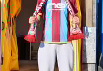 Town sign midfielder from National League South outfit