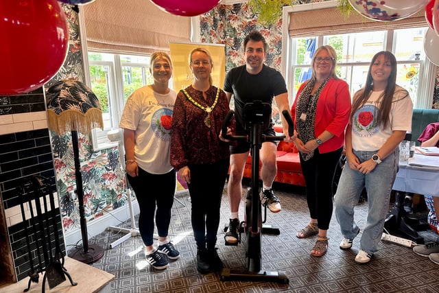 Wheels get turning on pub's 24-hour indoor charity bike ride