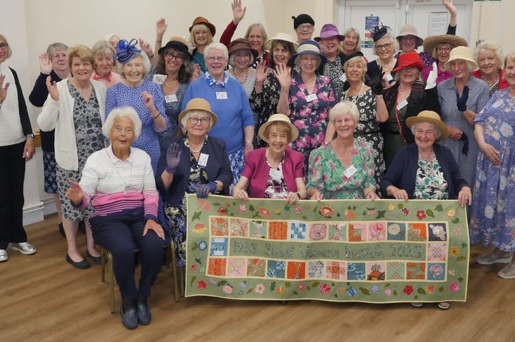 Members celebrate Sheet WI's 90th birthday.