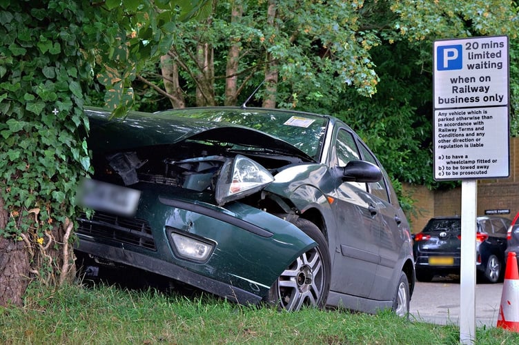 Car crashes into tree after two-car collision at Haslemere station