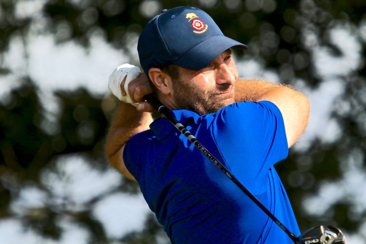 Hayling's Toby Burden tees off at the 15th at Cowdray Park, playing against Sussex in the South East League (Photo: Andrew Griffin/AMG PICTURES)