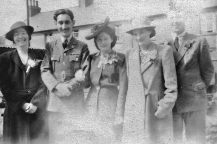 Stan Vaisey with his family after returning home from Japanese captivity.