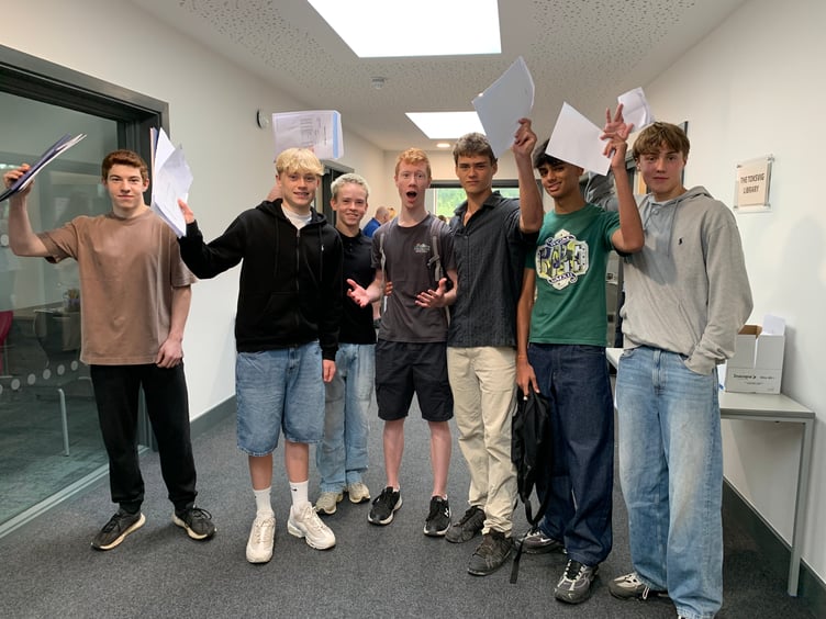 Students from Woolmer Hill celebrate their outstanding GCSE results