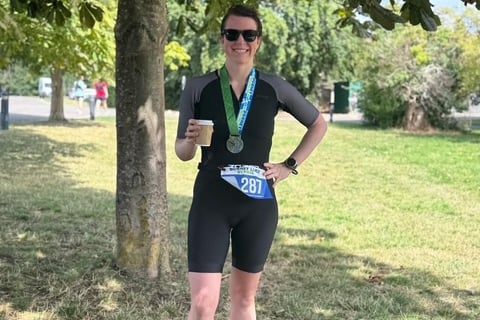 Laura Smith triumphant after the Dorney Lake triathlon