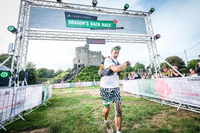 Adam Wade crosses the finish line after six gruelling days