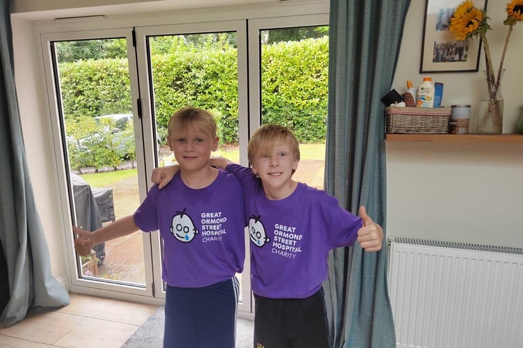George and Arlo, both ten, after completing one of their daily runs for Great Ormond Street Hospital