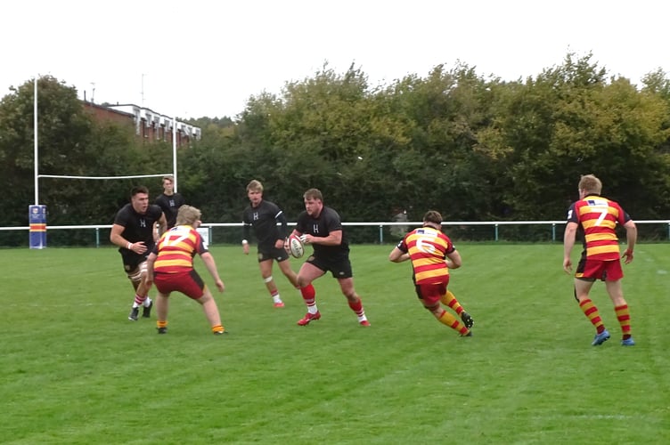 Jackson Clark attacks for Petersfield with Franco Tomic to his right, Chobham v Petersfield, October 4th 2025.