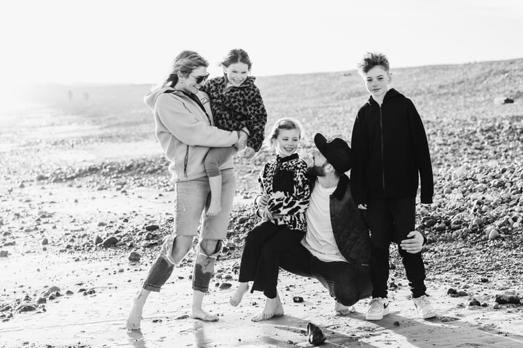 Sophie Disley and her family before she was diagnosed with breast cancer