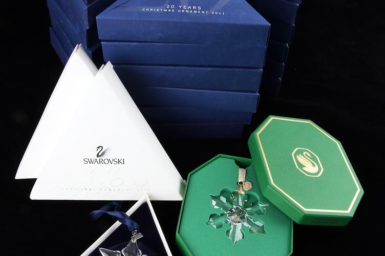 A collection of 22 Swarovski Christmas stars.