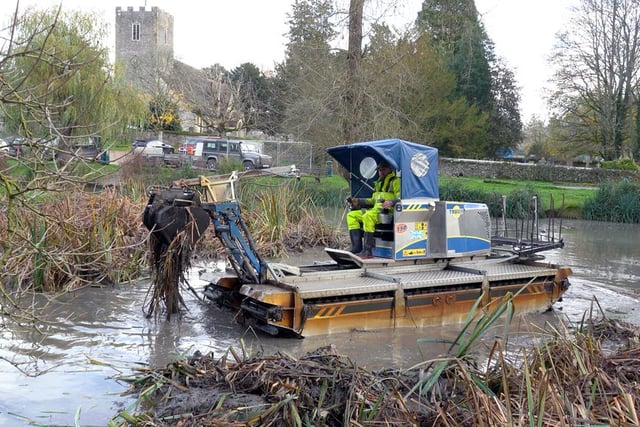 Water change as buoyant bulldozer is pond's scooper trooper