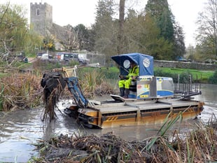 Water change as buoyant bulldozer is pond's scooper trooper