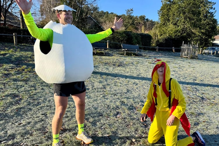 Harry May in his egg costume with his wife Lizzie dressed as a chicken