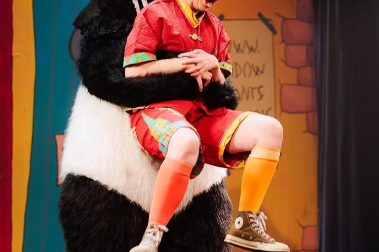 Naomi Robertson’s Wishee Washee and Kim Seymour’s Nobby the Panda in Haslemere Thespians’ Aladdin. Credit: Front of House Photography