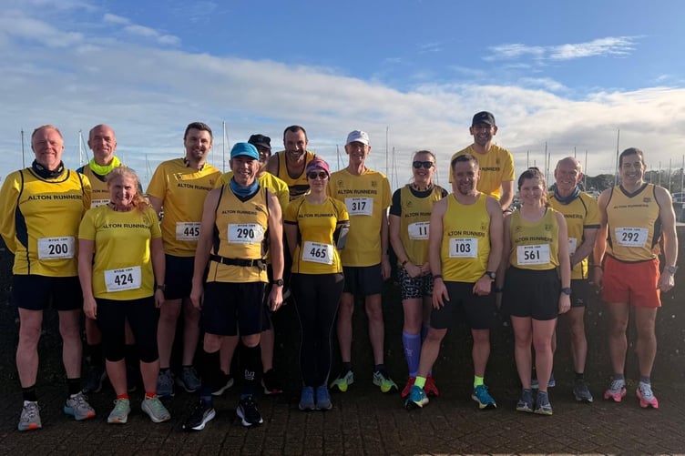 Alton Runners line up for a team photo in Ryde