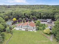 Sustainable woodland mansion with helipad hits market for £4m