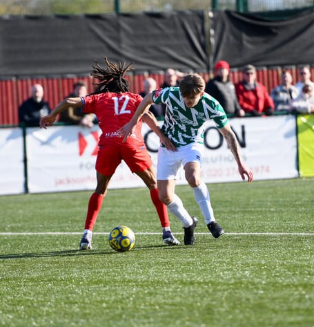 Owen Dean takes on Walton & Hersham's Stefan Parkes