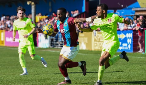 Farnham Town left-back Brandon Mason signs new one-year contract