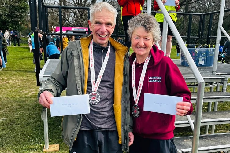 Andy Papworth and Linda Tyler collect their prizes