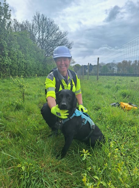 Stephanie Barrett and water leak sniffer dog Tico.