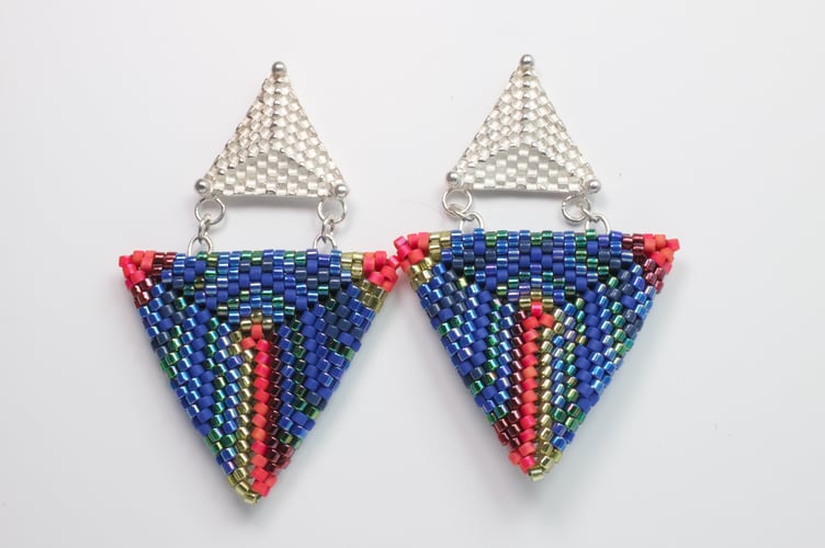 Peacock Poseur earrings by Emma Lawrence.