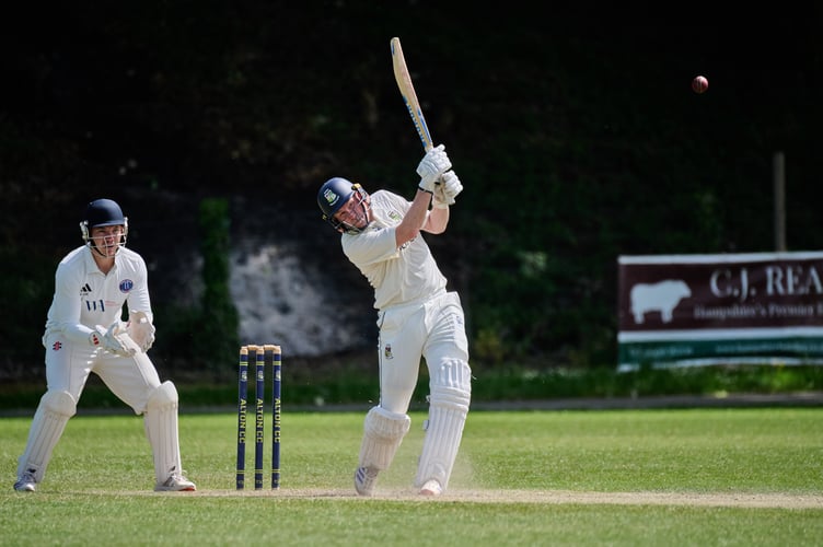 Alton batter Michael Heffernan hits out on his way to 90 against Hartley Wintney (Photo: Howard Gadsby)