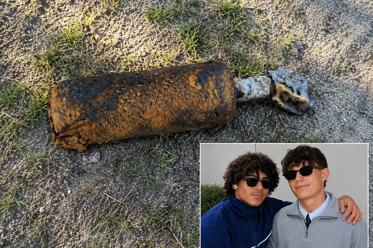 The unexploded ordnance found on Frensham Common. Pictured inset are Sebastian Catesby, 16, and James Fricker, 15, who discovered it.