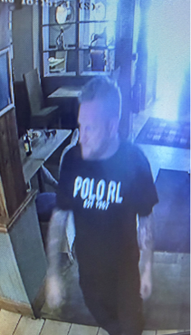 A man wanted in connection with an assault in a pub in Horndean.