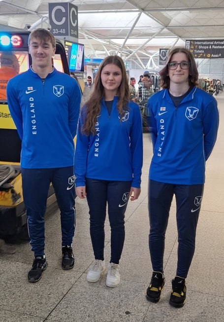 Kyle Piper (left), Erin Lloyd and Lois Bradshaw in their England kit