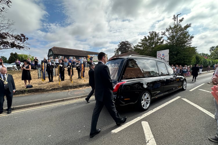 A heartfelt farewell: Residents lined the streets of Milford to bid Dame Penelope Keith a final goodbye.