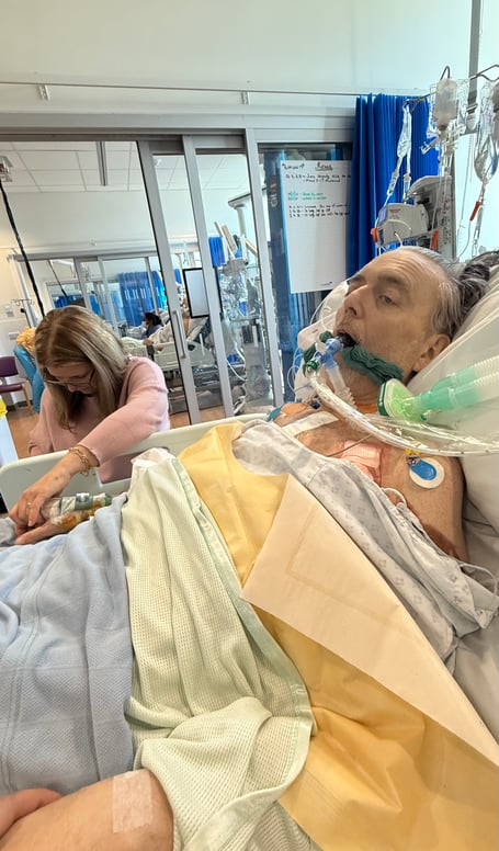 Mike Stamp of Farnham in hospital with his wife Jo.